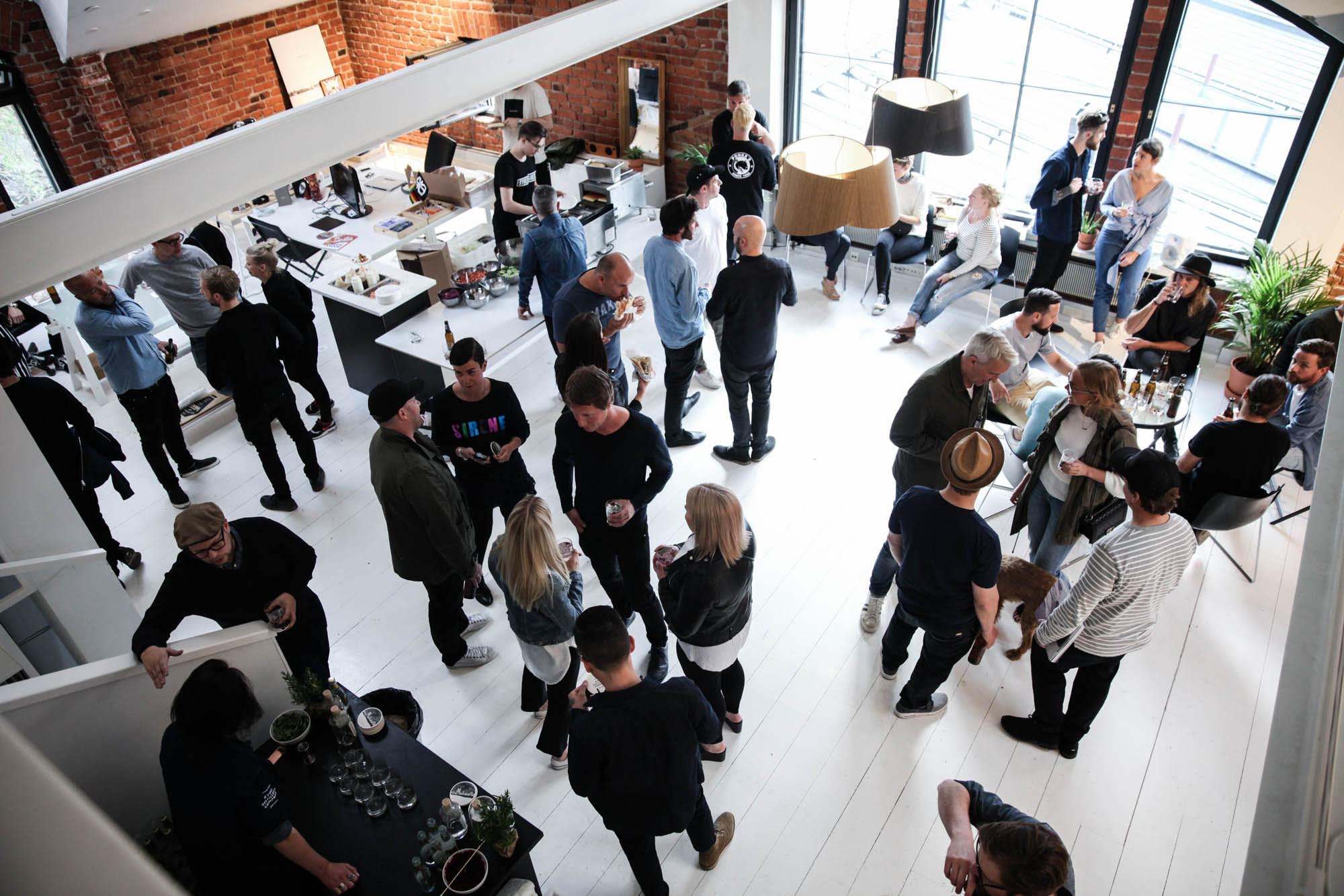 The new office is a loft with plenty of light, built on the top floor of an old harbour building.