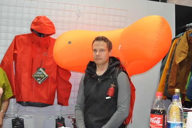 John showing the back after deployment. It has been designed so it doesn't intrude on the rider's peripheral vision, meaning they can deploy before an avalanche triggers and can still ride without distraction